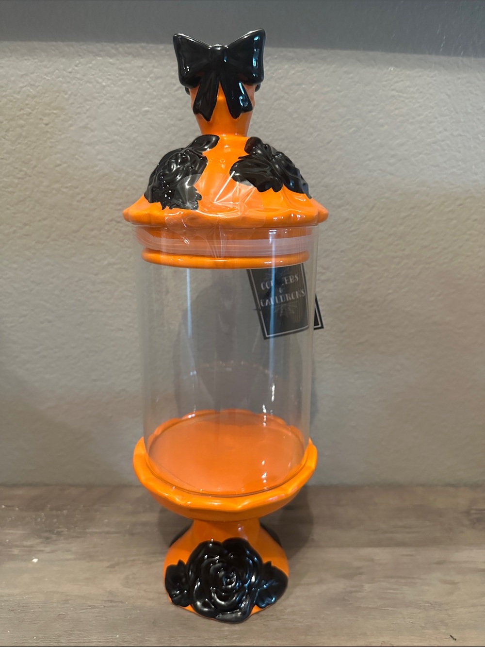 Cobwebs & Cauldrons Orange Holder with Black Bows/Flowers